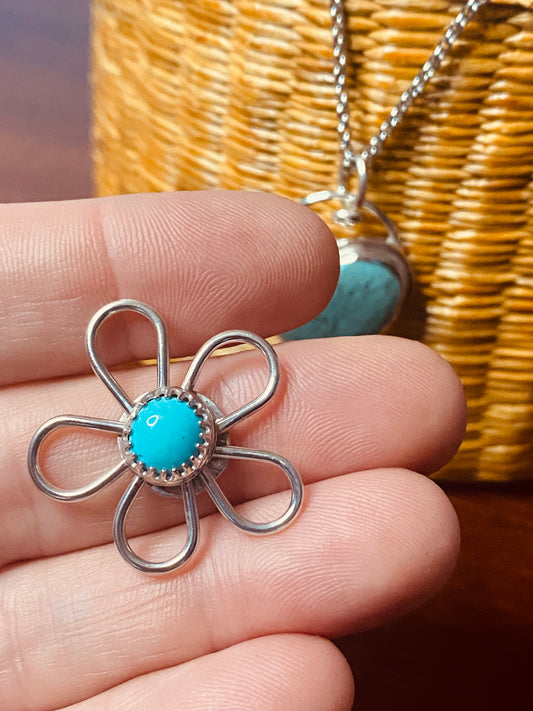 Sterling Silver with Turquoise Stone.